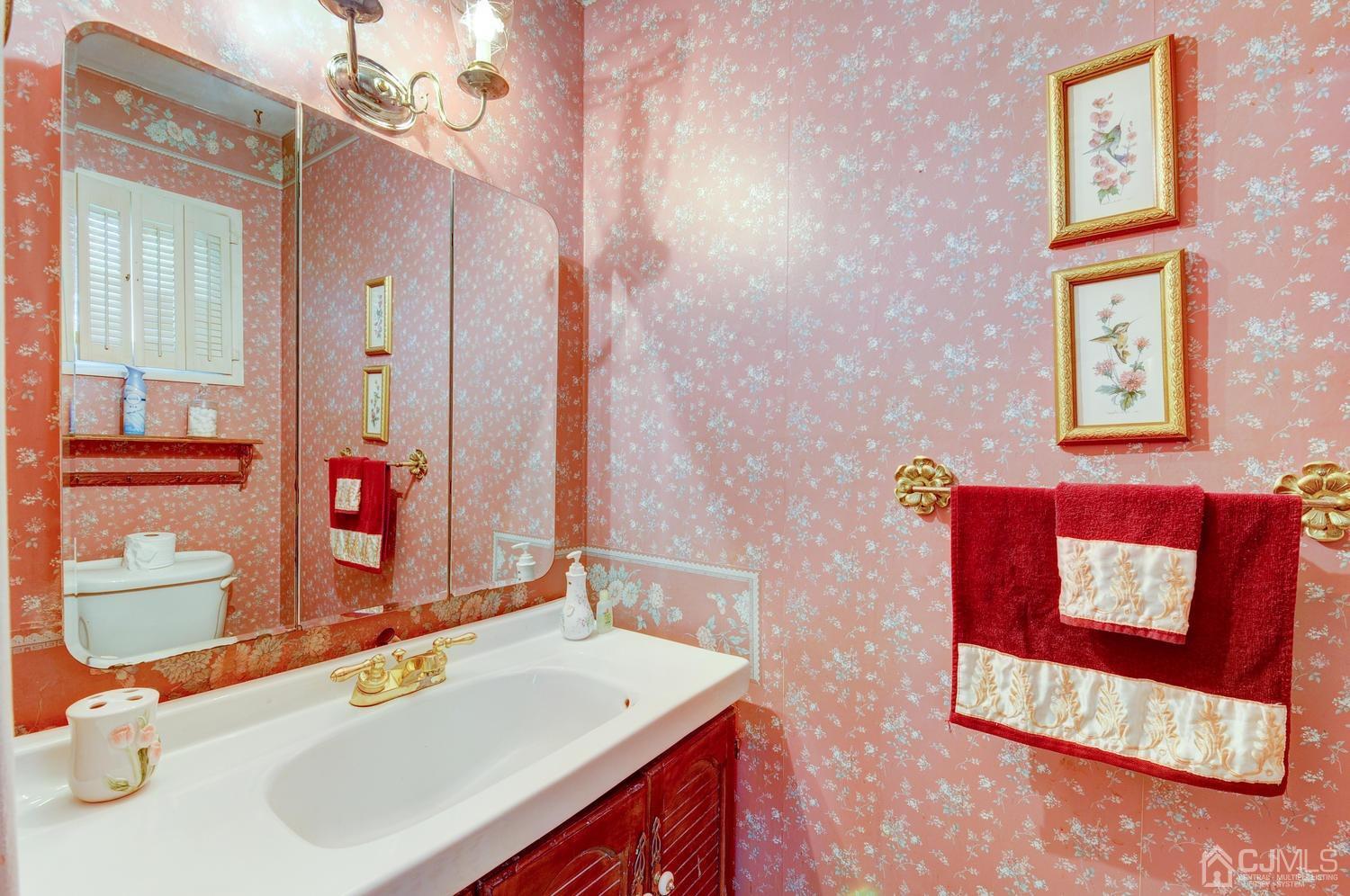 9 Villanova Road Old Bridge, NJ 08859 - Photo 21 of 29 a bathroom with a sink vanity and a mirror