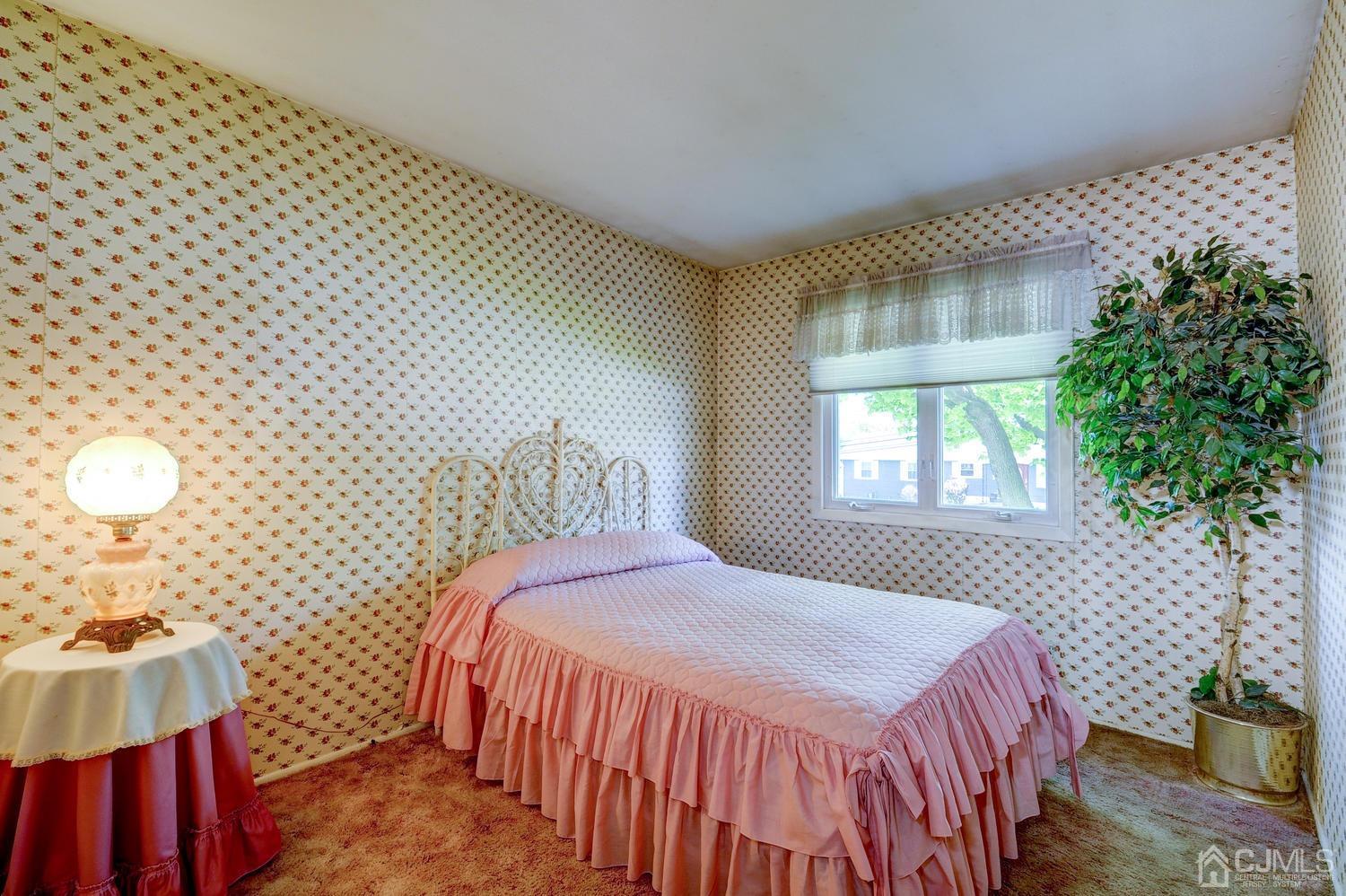 9 Villanova Road Old Bridge, NJ 08859 - Photo 22 of 29 a bedroom with a bed and a window