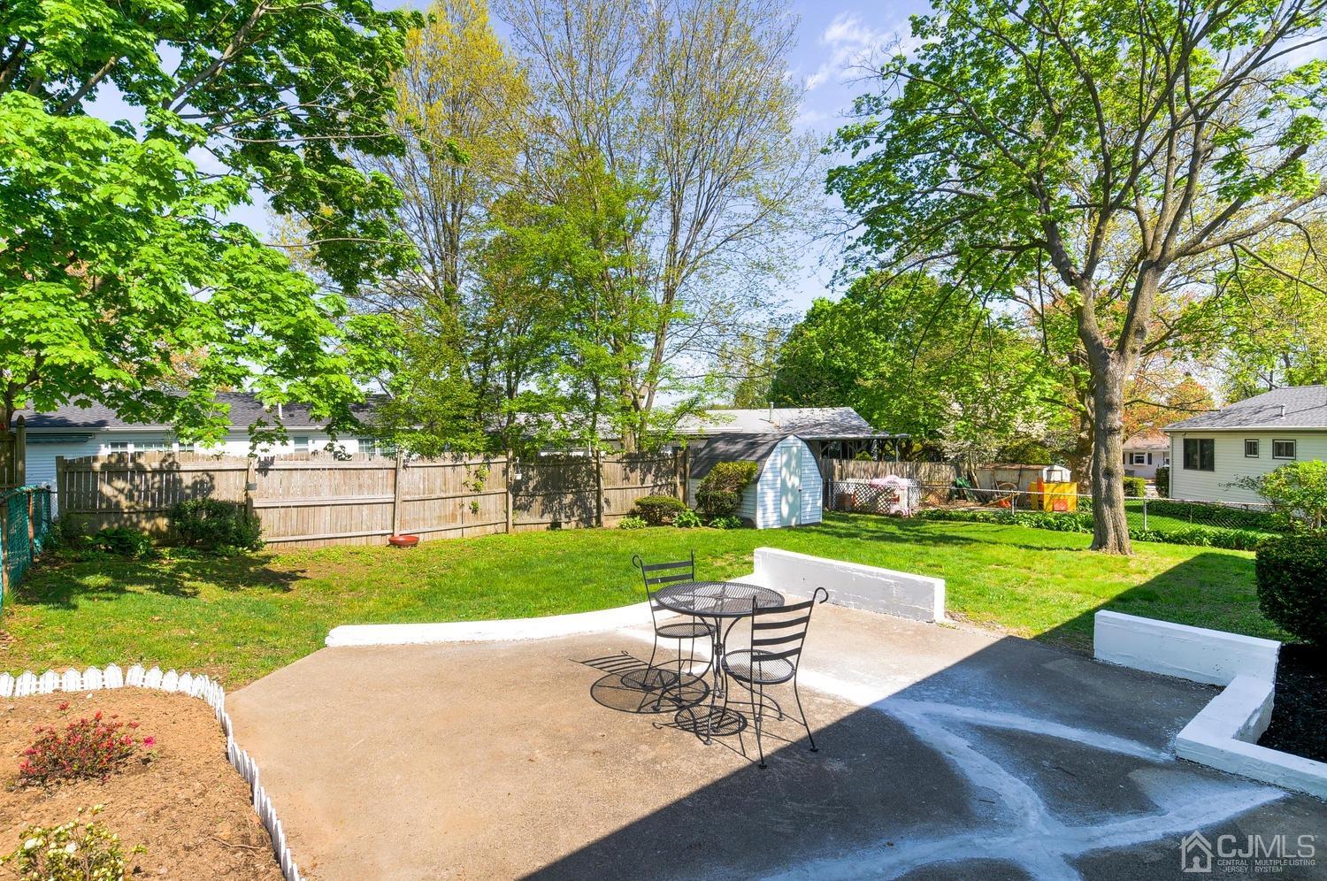 9 Villanova Road Old Bridge, NJ 08859 - Photo 27 of 29 a view of a house with a yard and sitting area