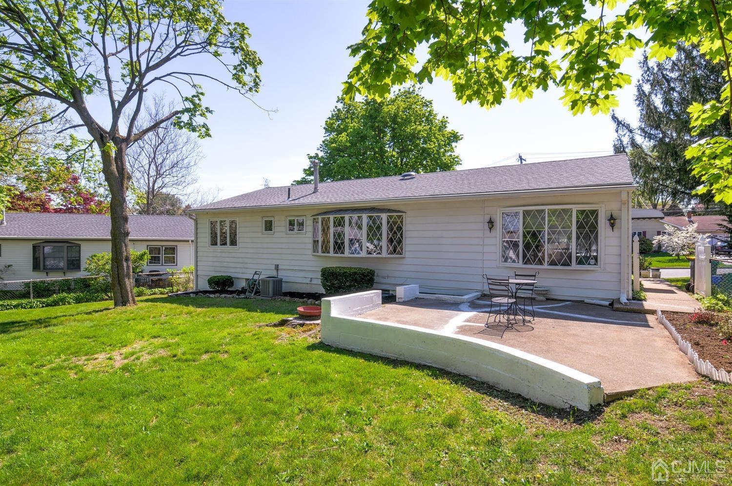 9 Villanova Road Old Bridge, NJ 08859 - Photo 29 of 29 a view of a house with a yard patio and a tree