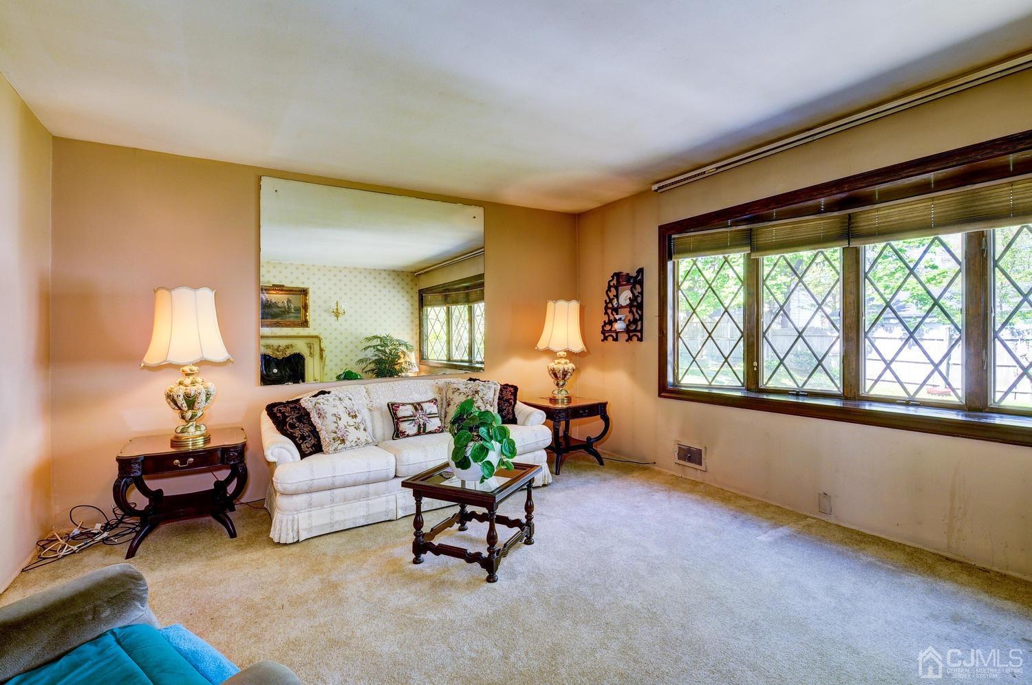 9 Villanova Road Old Bridge, NJ 08859 - Photo 5 of 29 a living room with furniture and a large window