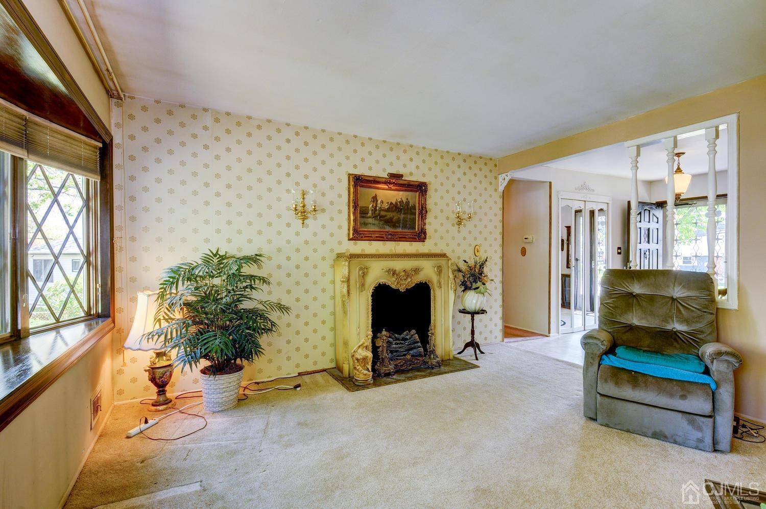 9 Villanova Road Old Bridge, NJ 08859 - Photo 7 of 29 a living room with furniture and a fireplace