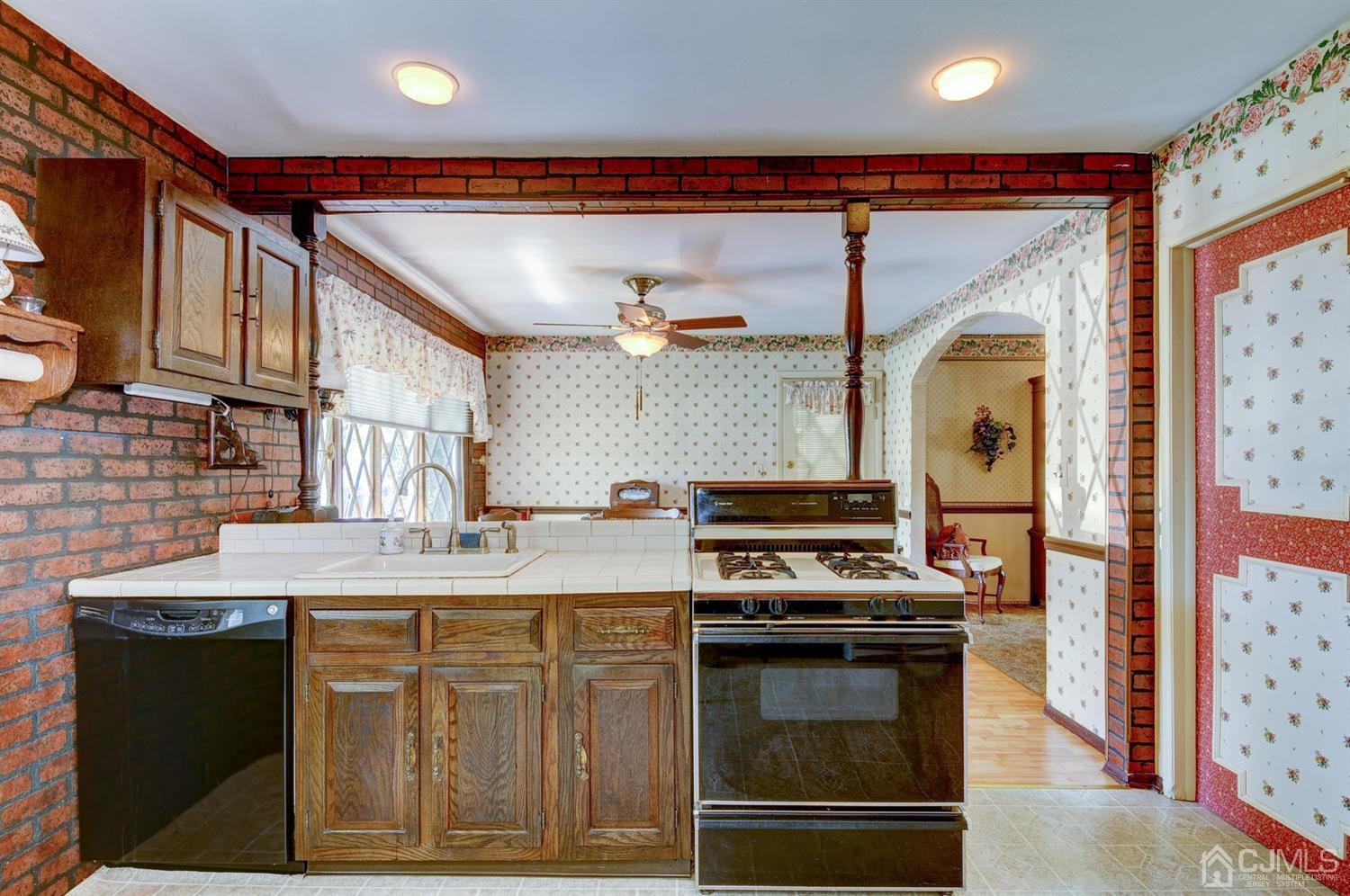 9 Villanova Road Old Bridge, NJ 08859 - Photo 9 of 29 a kitchen with stainless steel appliances granite countertop a stove and a sink