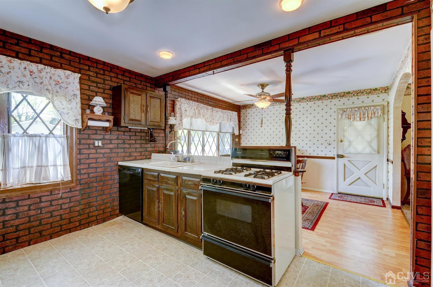 9 Villanova Road Old Bridge, NJ 08859 - Photo 10 of 29 a kitchen with a stove and a sink