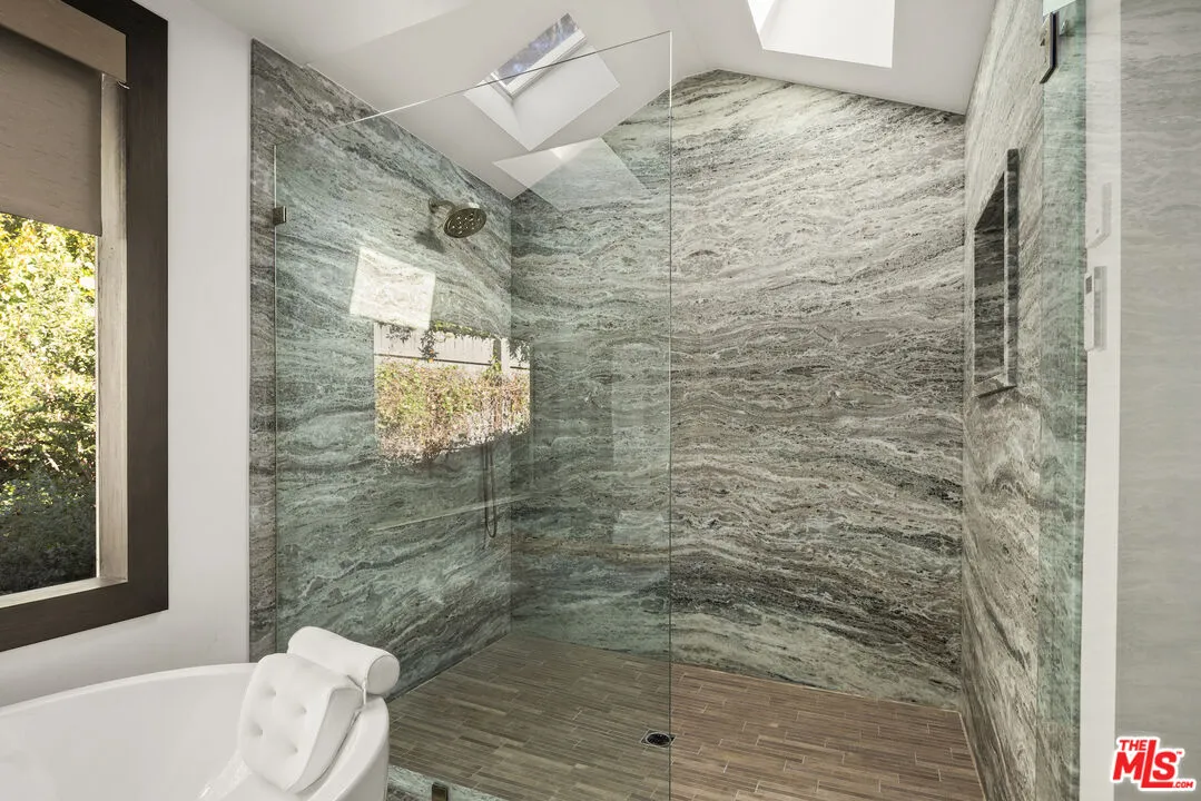 3 Latimer Road Santa Monica, CA 90402 - Photo 1 of 1 a bathroom with a shower and a toilet