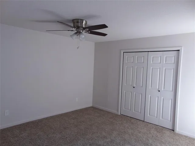 a view of a livingroom with a fan