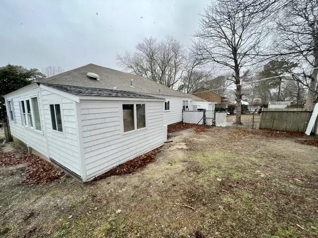 32 Elton Road West Yarmouth, MA 02673 - Photo 5 of 14 a view of a house with a yard