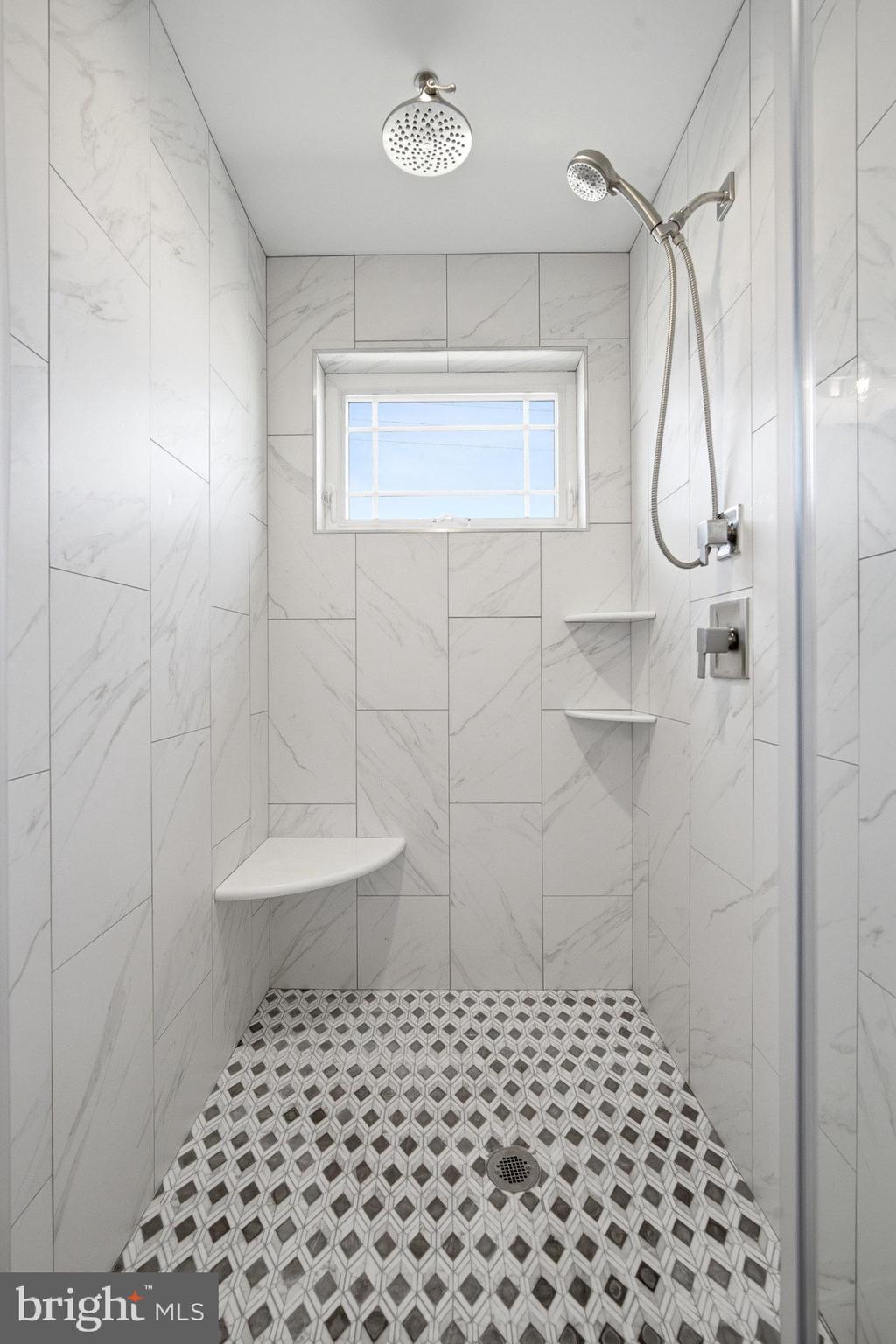 2500 Bayshore Avenue Brigantine, NJ 08203 - Photo 11 of 62 a bathroom with a shower