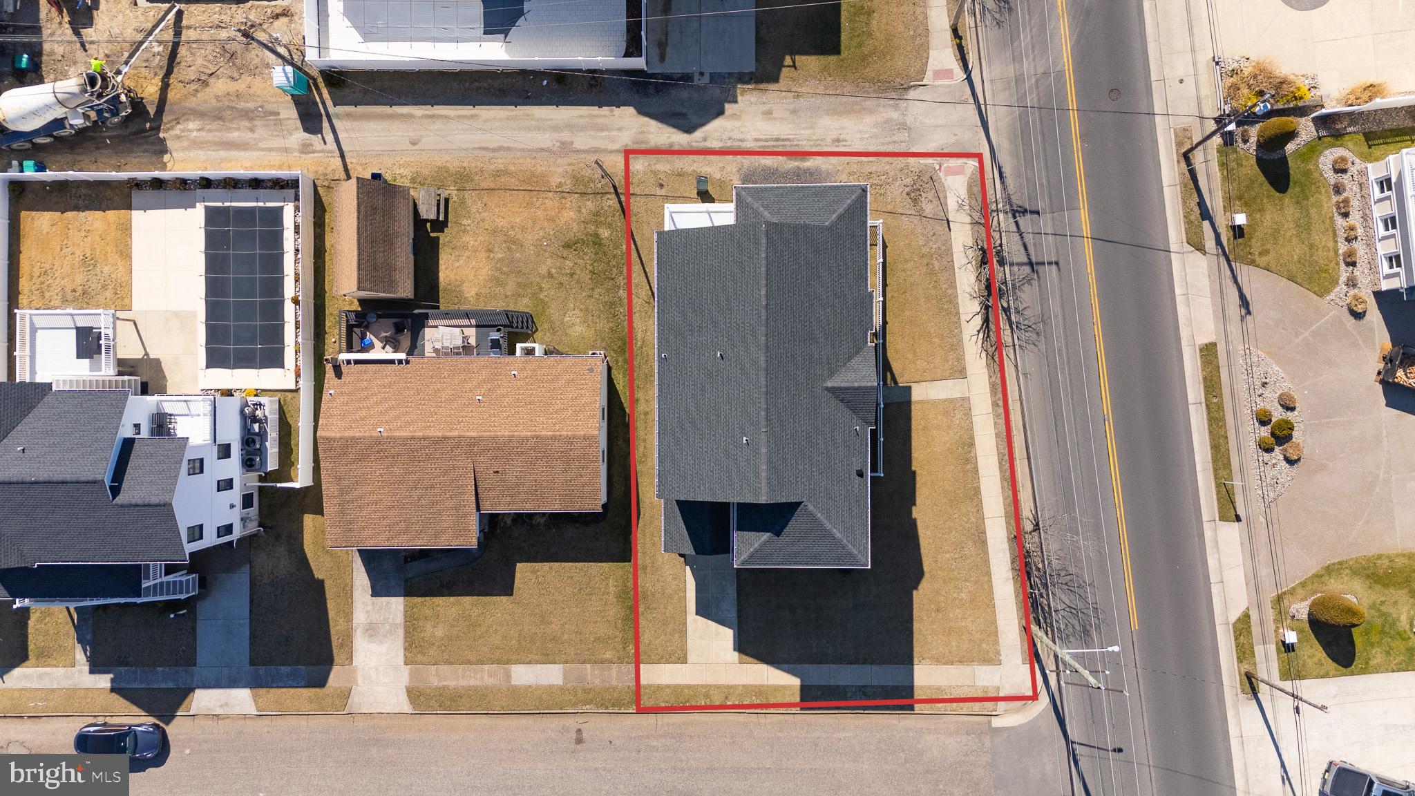 2500 Bayshore Avenue Brigantine, NJ 08203 - Photo 48 of 62 a front view of a house with a street