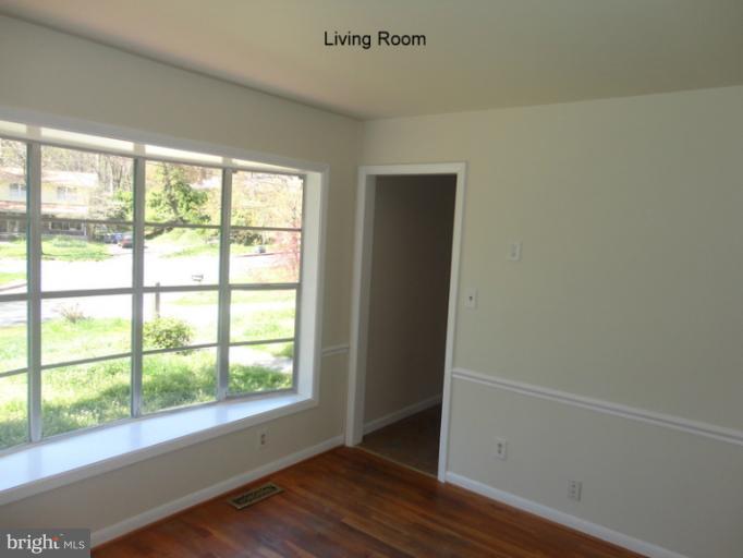 12803 Broadmore Road Silver Spring, MD 20904 - Photo 2 of 11 a view of small space with wooden floor and a window