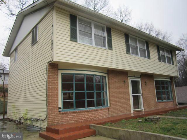 12803 Broadmore Road Silver Spring, MD 20904 - Photo 11 of 11 a front view of a house