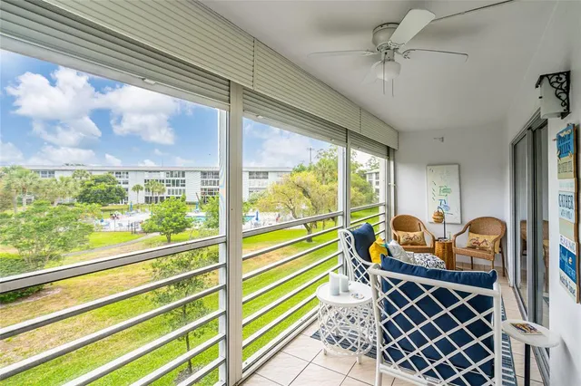 a living room with large windows