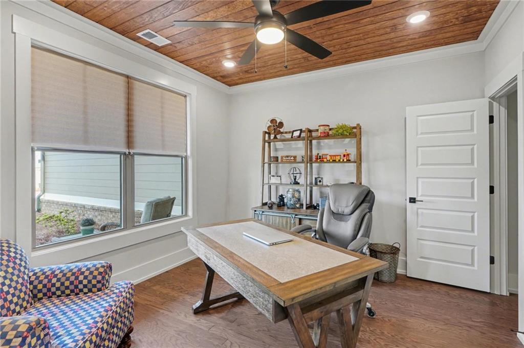 287 Conner Lane Williamson, GA 30292 - Photo 16 of 33 a work room with furniture and wooden floor