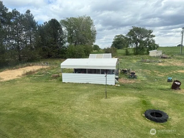 a view of a lake with a yard
