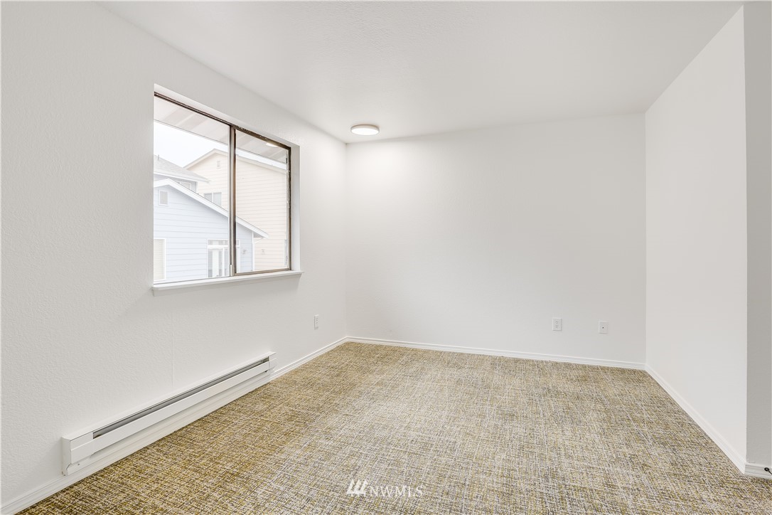4114 Northeast 5th Street Renton, WA 98059 - Photo 15 of 20 an empty room with windows