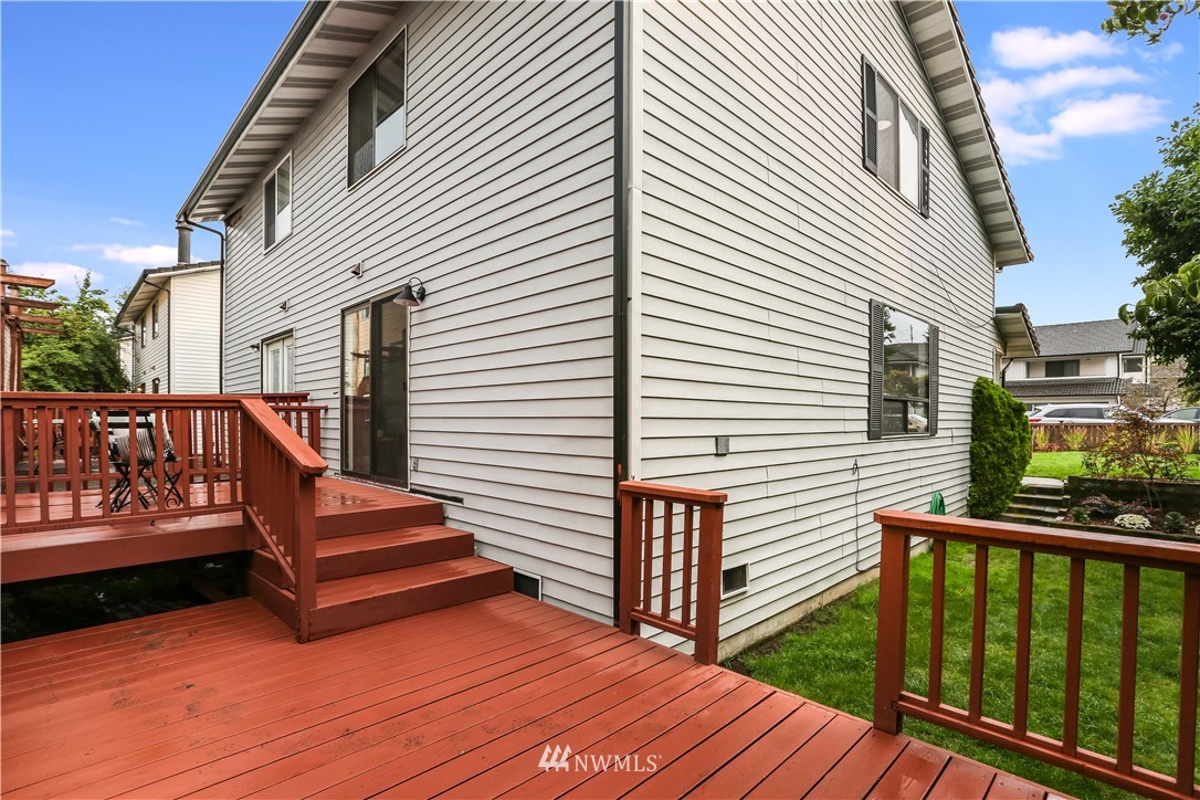 4114 Northeast 5th Street Renton, WA 98059 - Photo 18 of 20 a view of a roof deck with wooden floor and fence