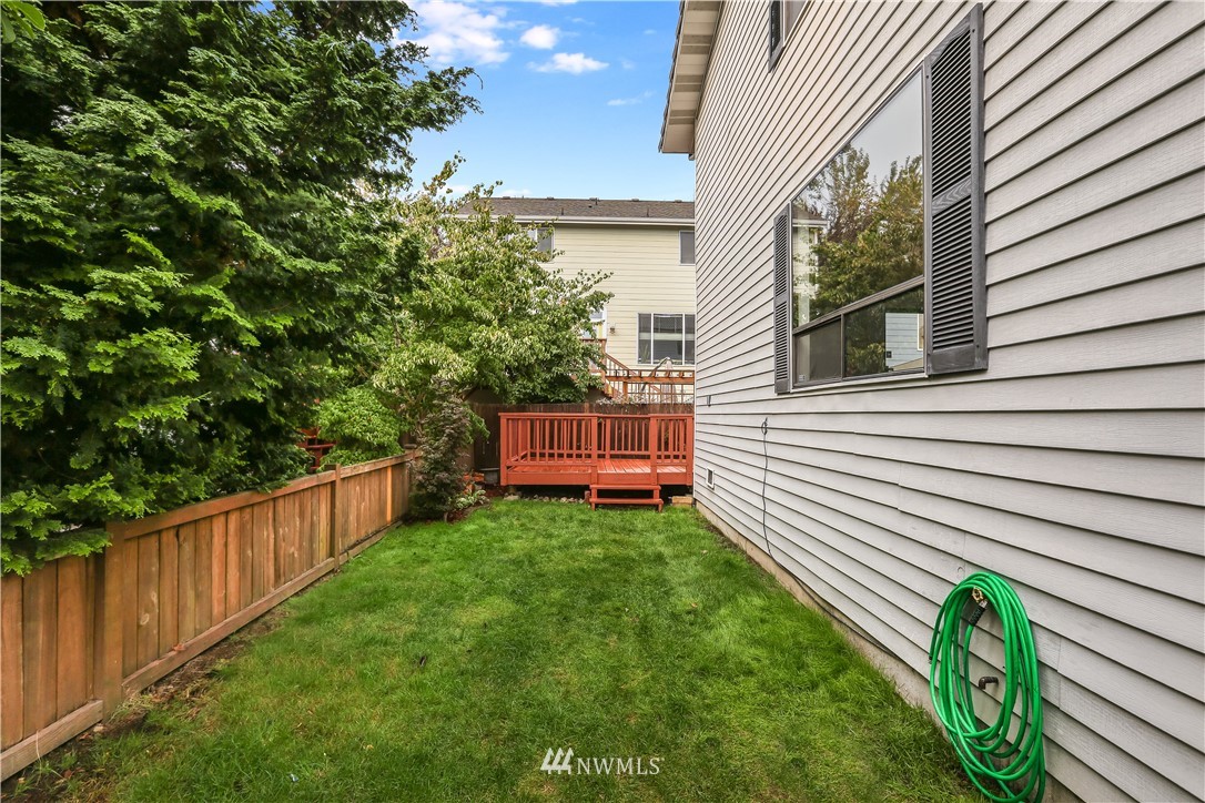 4114 Northeast 5th Street Renton, WA 98059 - Photo 19 of 20 a backyard of a house with seating space