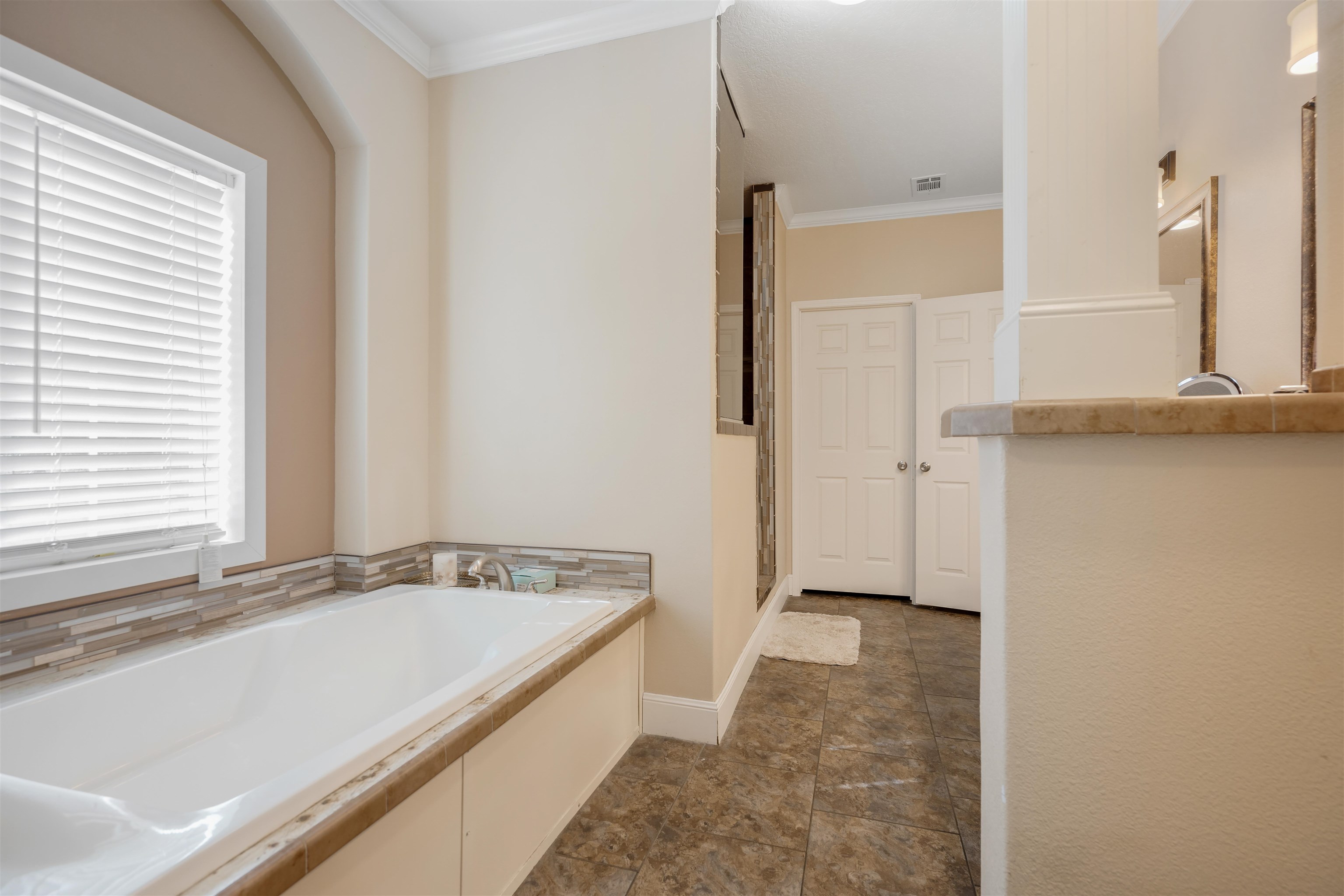 3000 Lightsey Road St. Augustine, FL 32084 - Photo 14 of 35 a bathroom with a tub and a sink