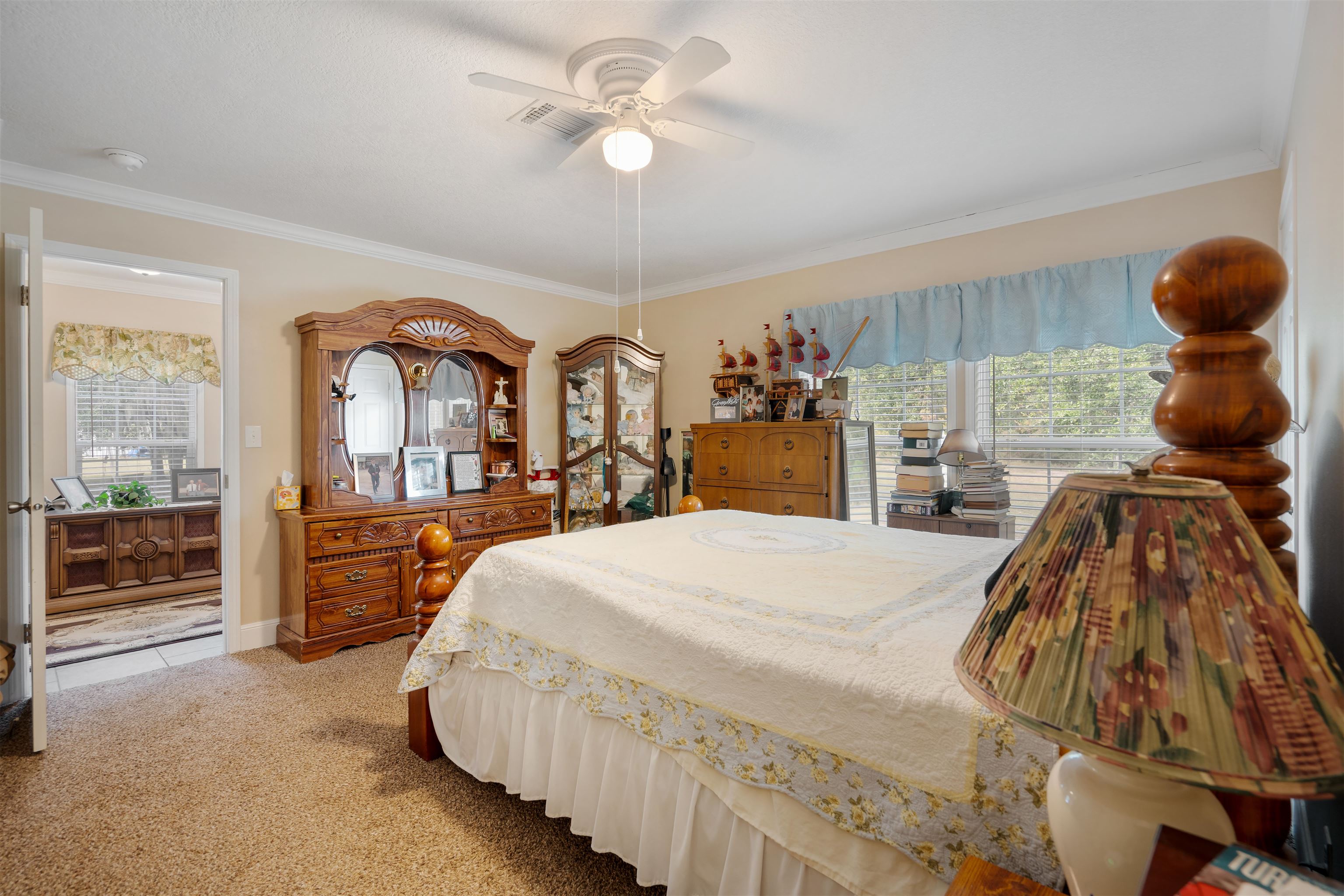 3000 Lightsey Road St. Augustine, FL 32084 - Photo 16 of 35 a bed room with a bed and dresser with mirror