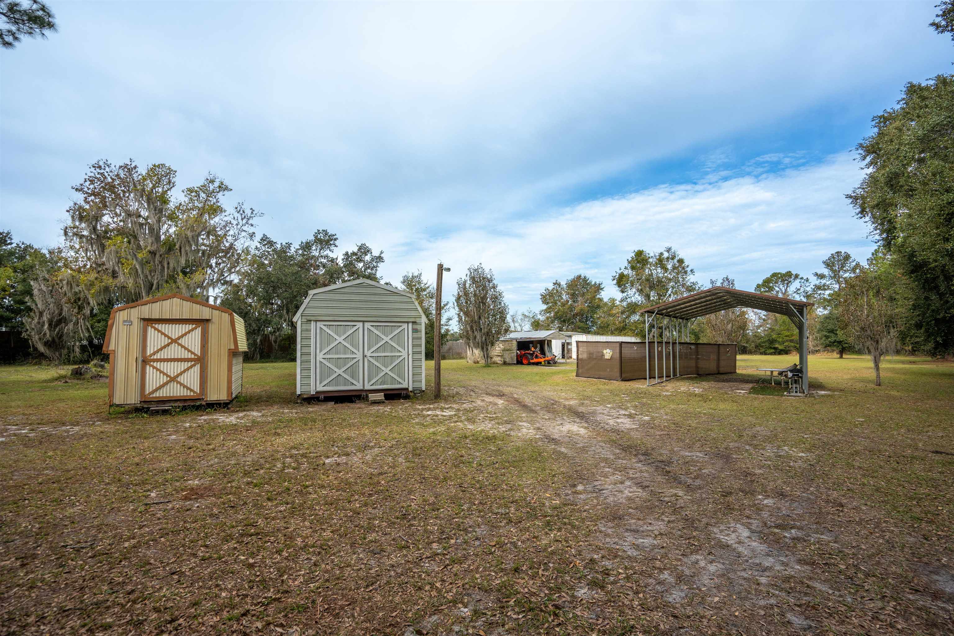 3000 Lightsey Road St. Augustine, FL 32084 - Photo 28 of 35 a big house with a big yard and large trees