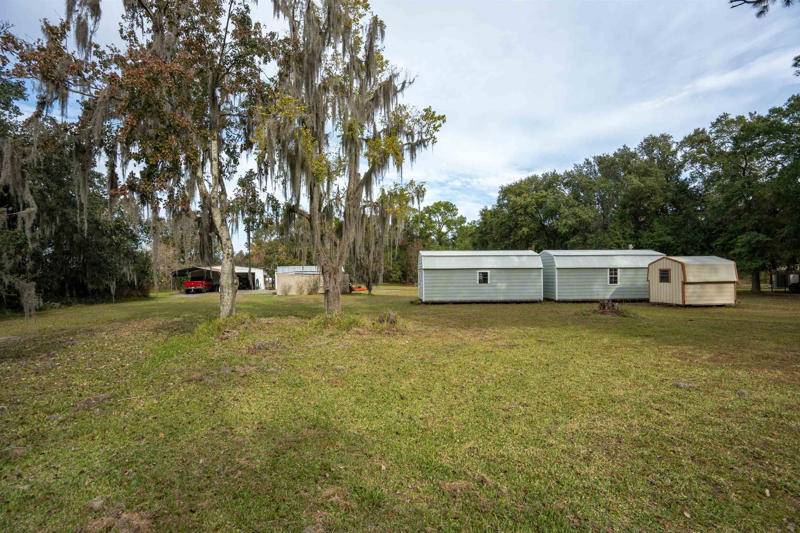 3000 Lightsey Road St. Augustine, FL 32084 - Photo 29 of 35 a view of a house with a yard