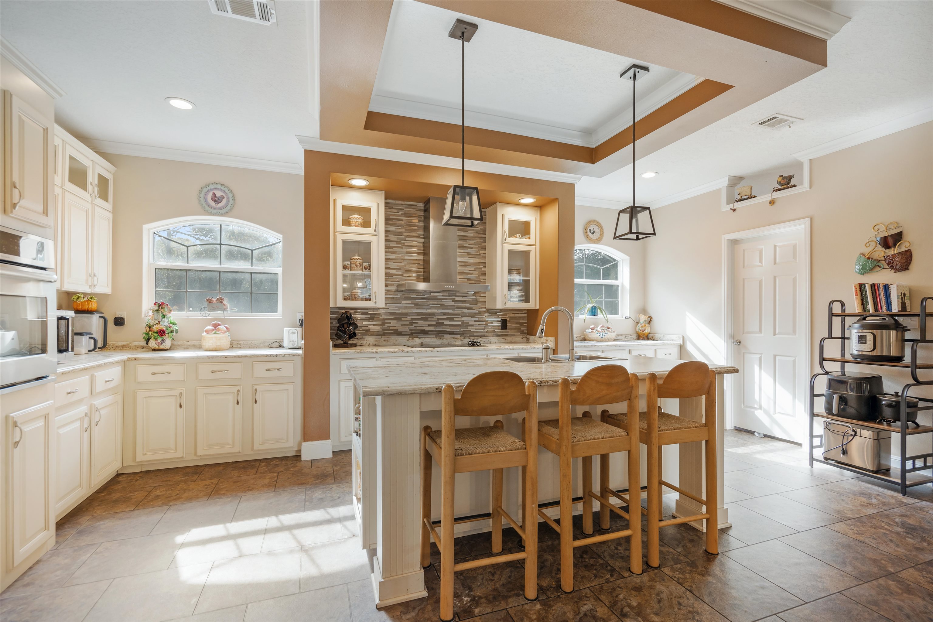 3000 Lightsey Road St. Augustine, FL 32084 - Photo 6 of 35 a dining hall with stainless steel appliances granite countertop furniture and a large window