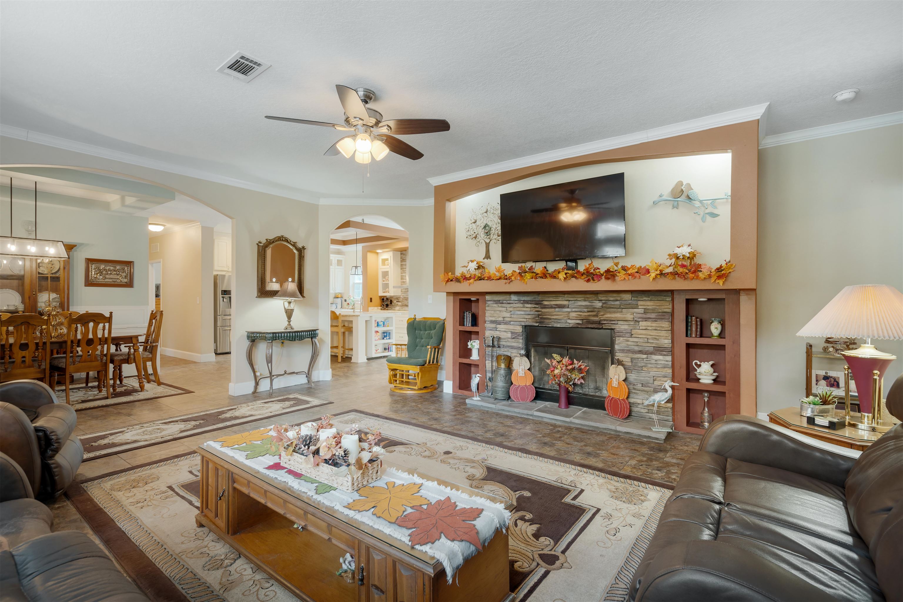 3000 Lightsey Road St. Augustine, FL 32084 - Photo 8 of 35 a living room with furniture and a fireplace