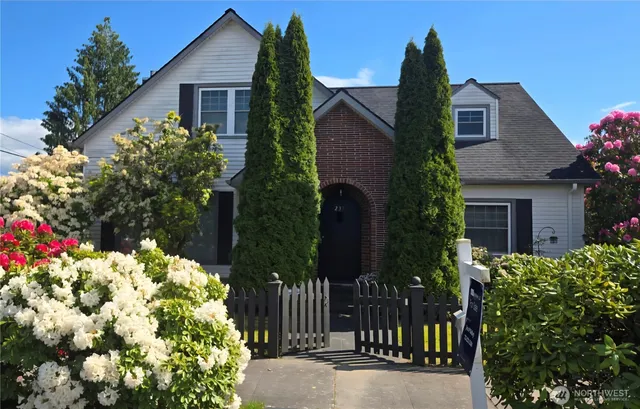 front view of a house with a yard