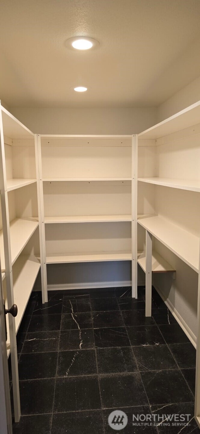 237 C Street Southwest Castle Rock, WA 98611 - Photo 19 of 33 a view of a room with shelves
