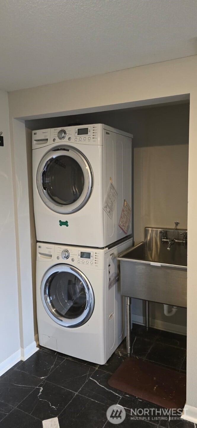 237 C Street Southwest Castle Rock, WA 98611 - Photo 21 of 33 a utility room with dryer and washer