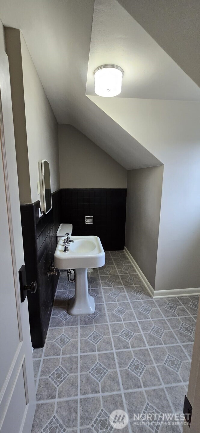 237 C Street Southwest Castle Rock, WA 98611 - Photo 33 of 33 a bathroom with a sink and a toilet