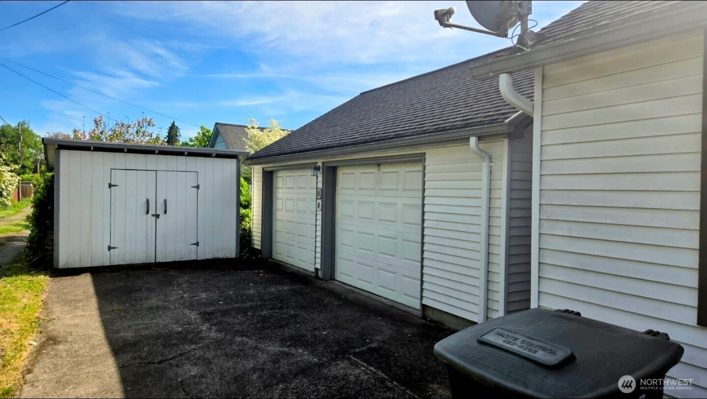 237 C Street Southwest Castle Rock, WA 98611 - Photo 8 of 33 a view of a house with backyard and a window