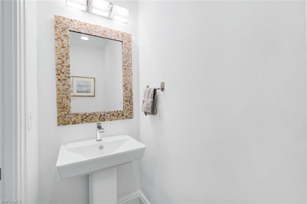 1035 3rd Avenue South, Unit 305 Naples, FL 34102 - Photo 17 of 34 Powder room