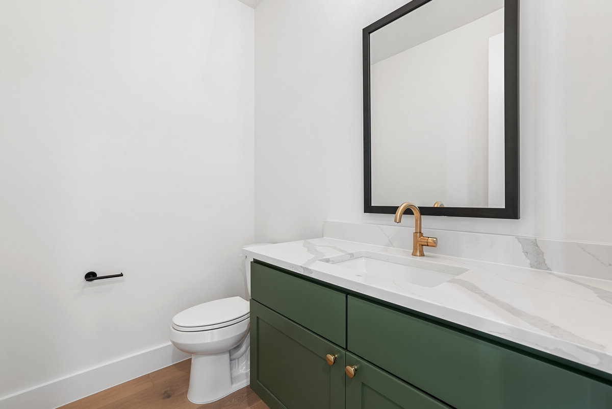 6010 Adhara Pass Austin, TX 78730 - Photo 24 of 38 a bathroom with a toilet sink and mirror