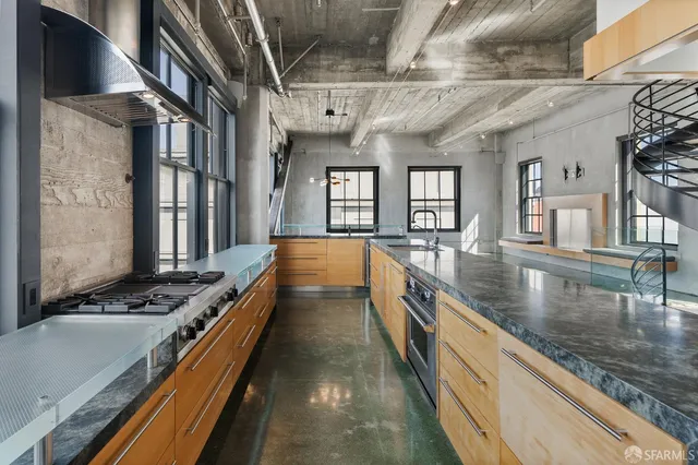 a view of a living room with a large window
