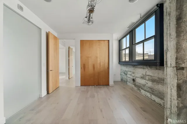 an empty room with windows