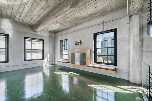 a view of a living room and bathroom