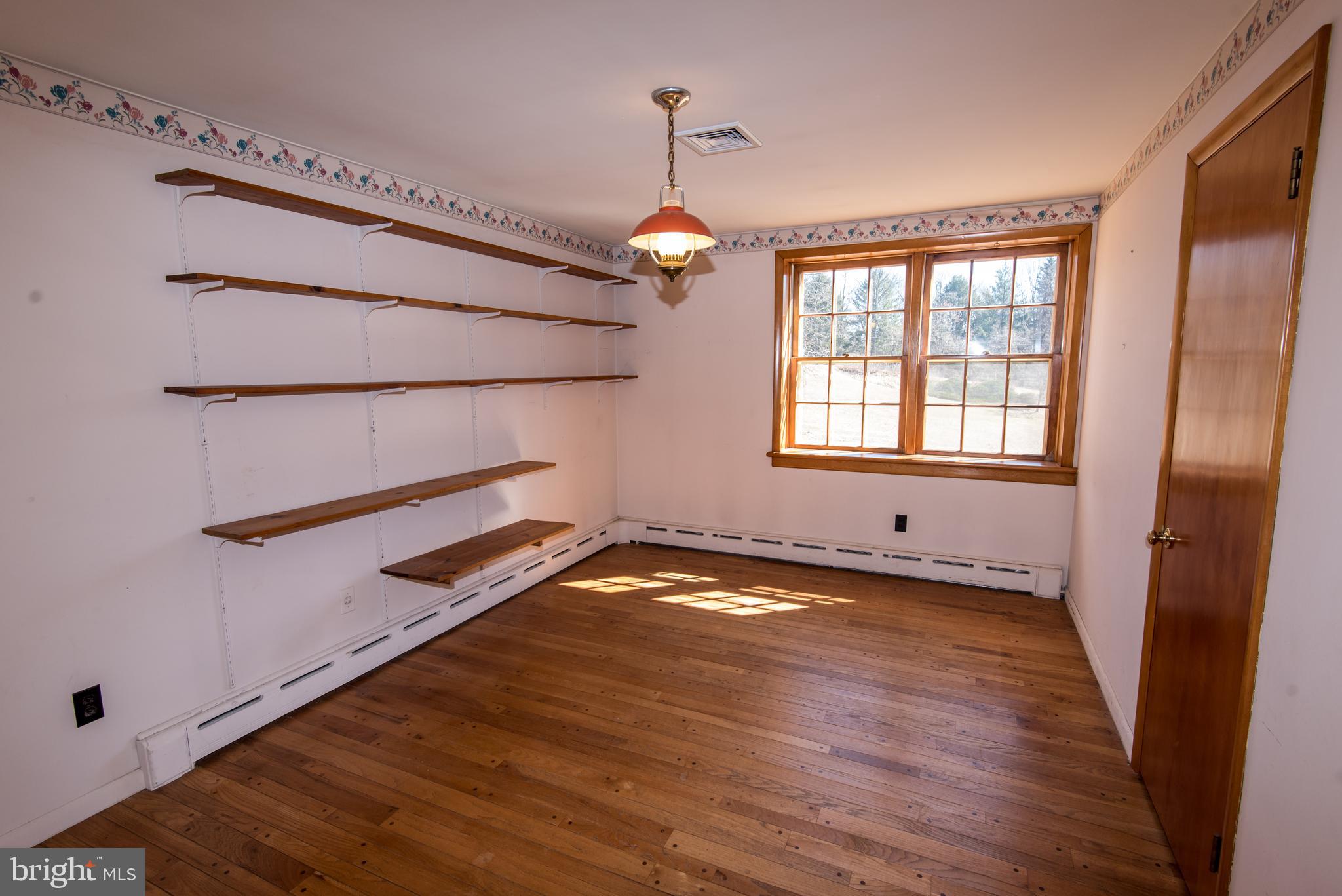 139 Mattson Road Garnet Valley, PA 19060 - Photo 13 of 39 Bedroom Two with Shelving and SE Orientation