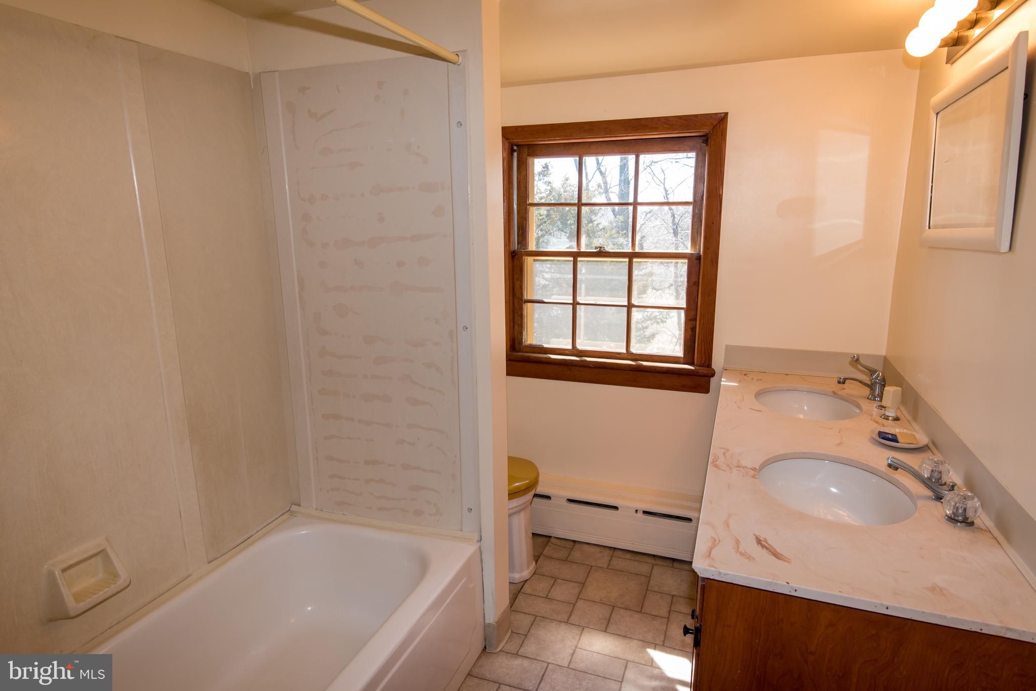 139 Mattson Road Garnet Valley, PA 19060 - Photo 23 of 39 Second Floor Hallway Bathroom with Double Sinks