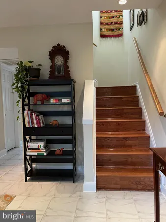 a view of entryway with wooden floor