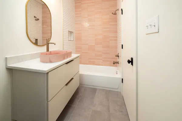 a bathroom with a sink and a mirror