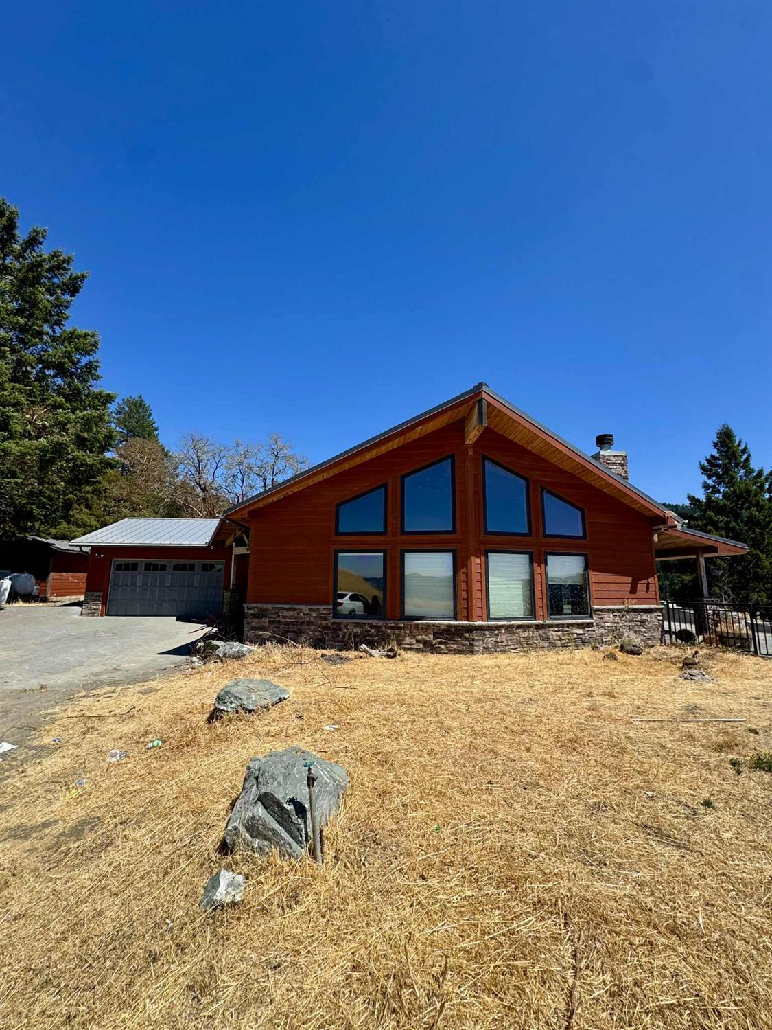a view of a house with snow on the ground