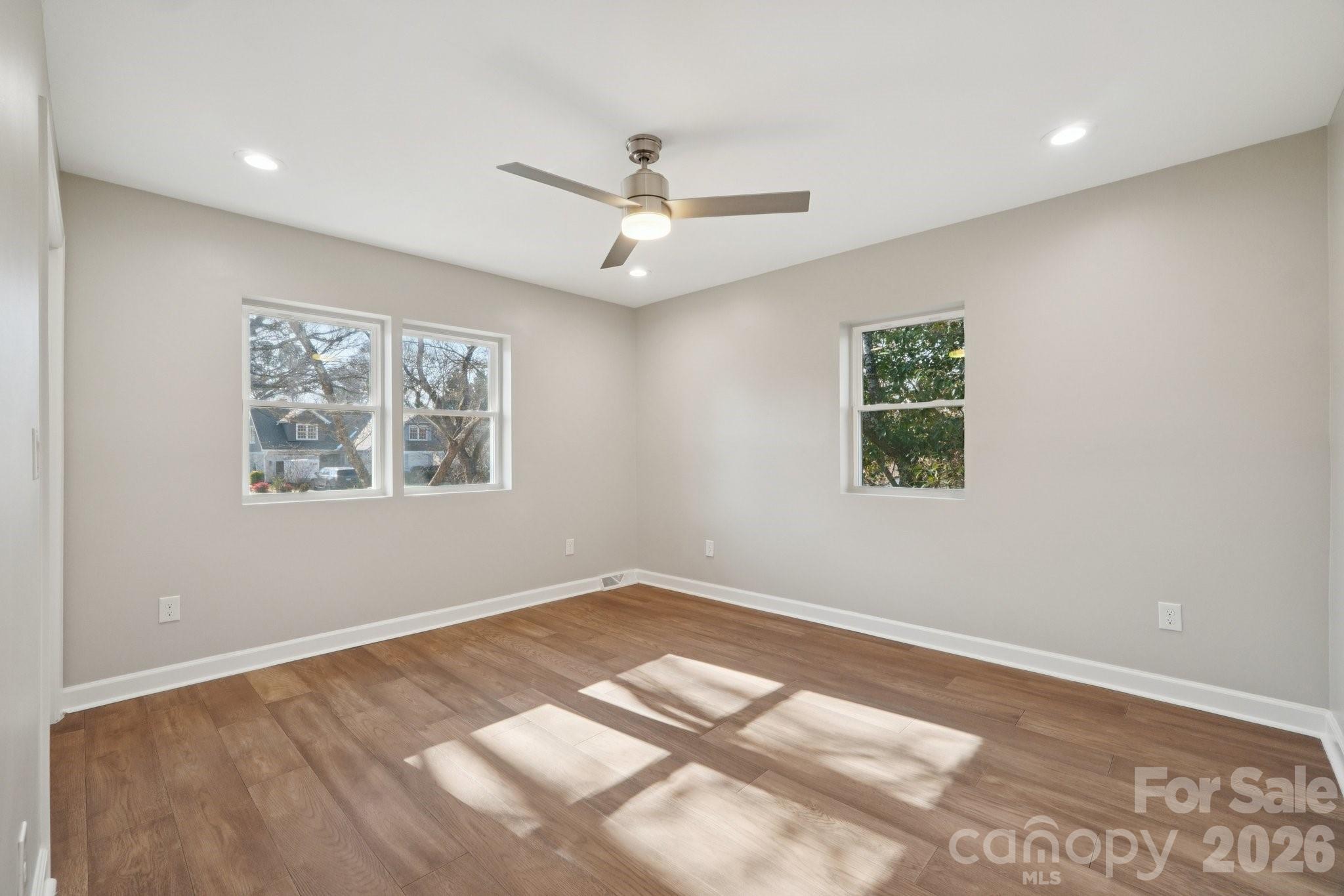 1216 Old Farm Road Charlotte, NC 28226 - Photo 20 of 36 a view of an empty room with a window