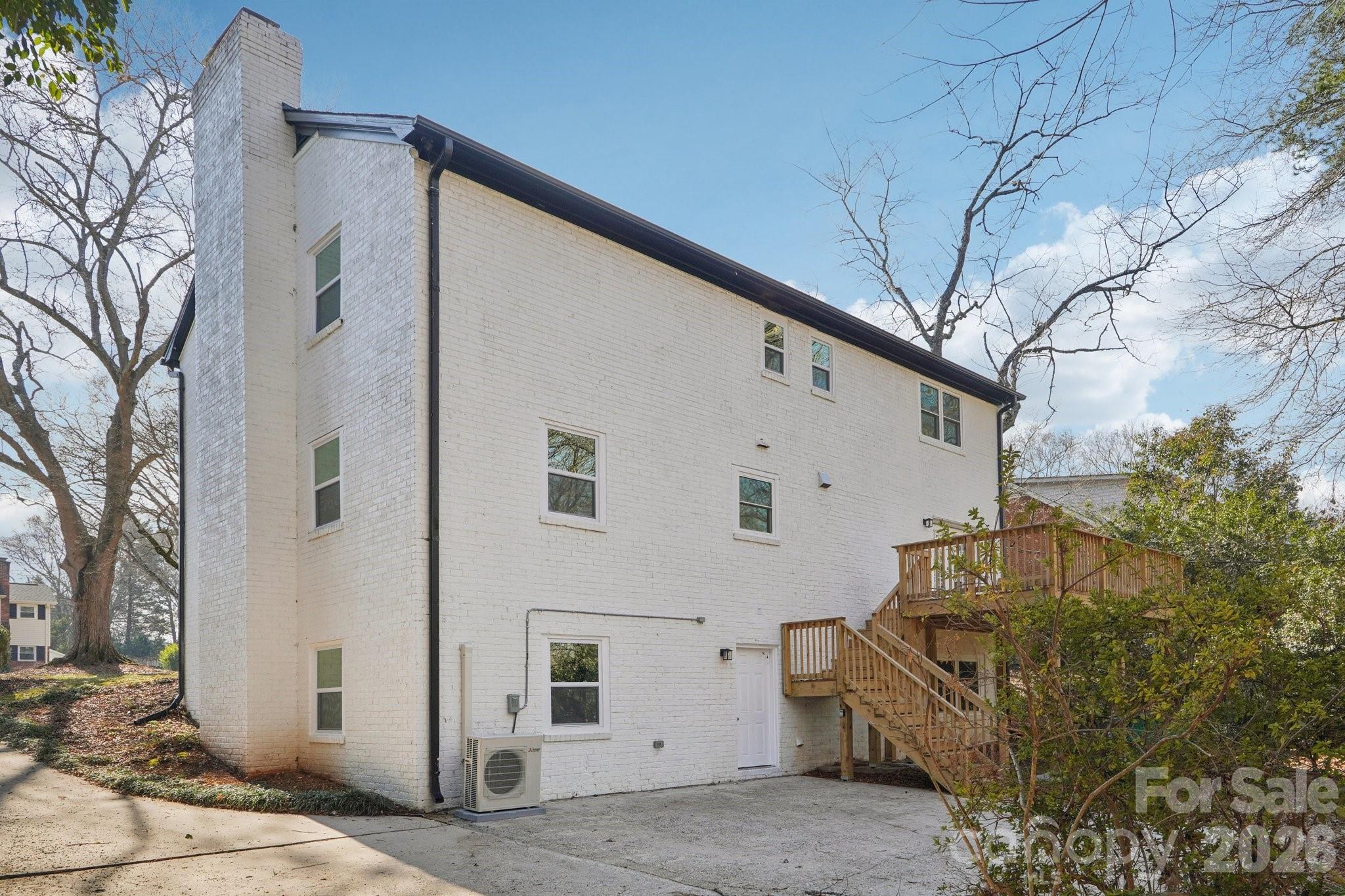 1216 Old Farm Road Charlotte, NC 28226 - Photo 31 of 36 a view of a house with a yard