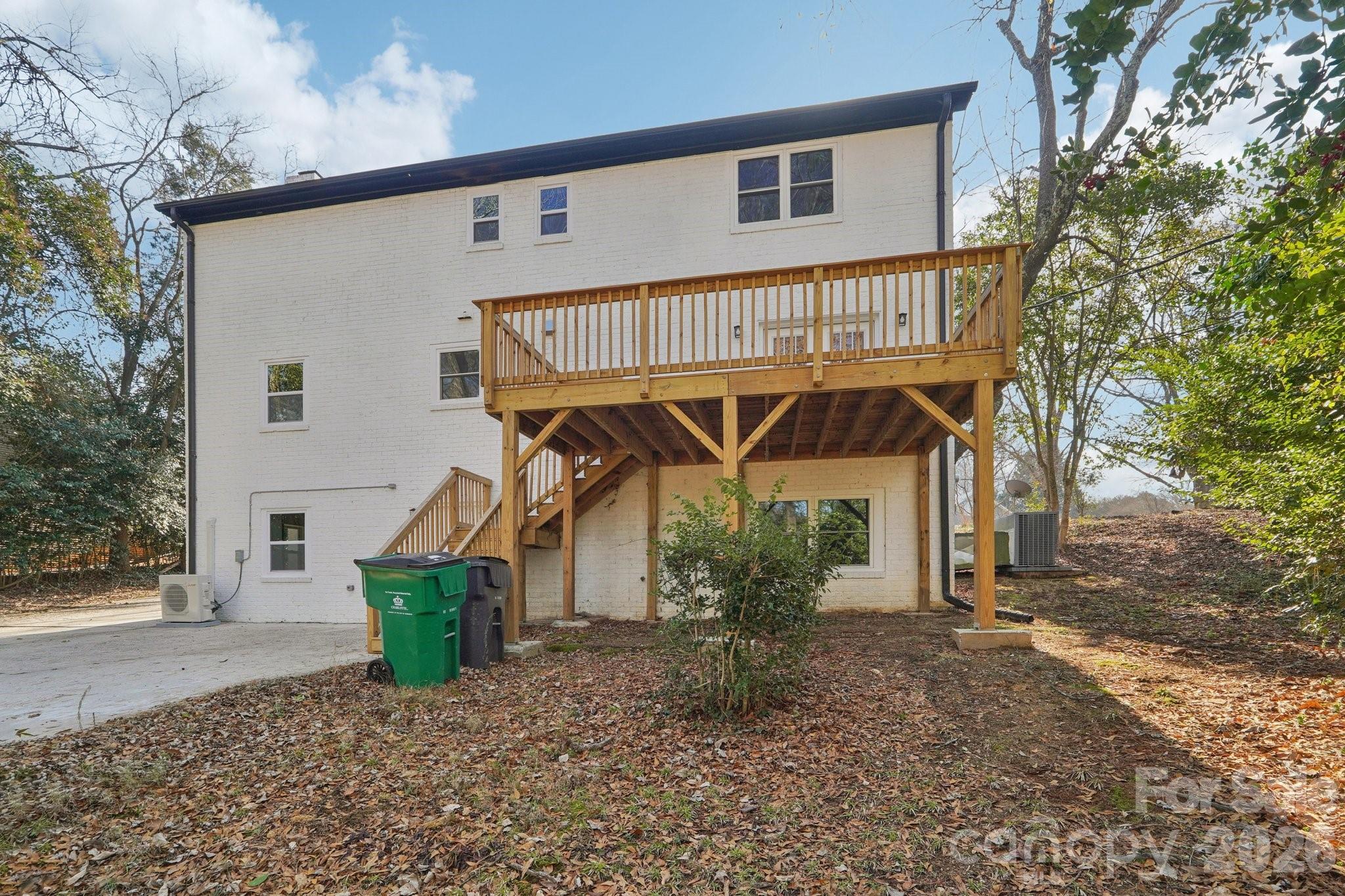 1216 Old Farm Road Charlotte, NC 28226 - Photo 32 of 36 a front view of a house with garden