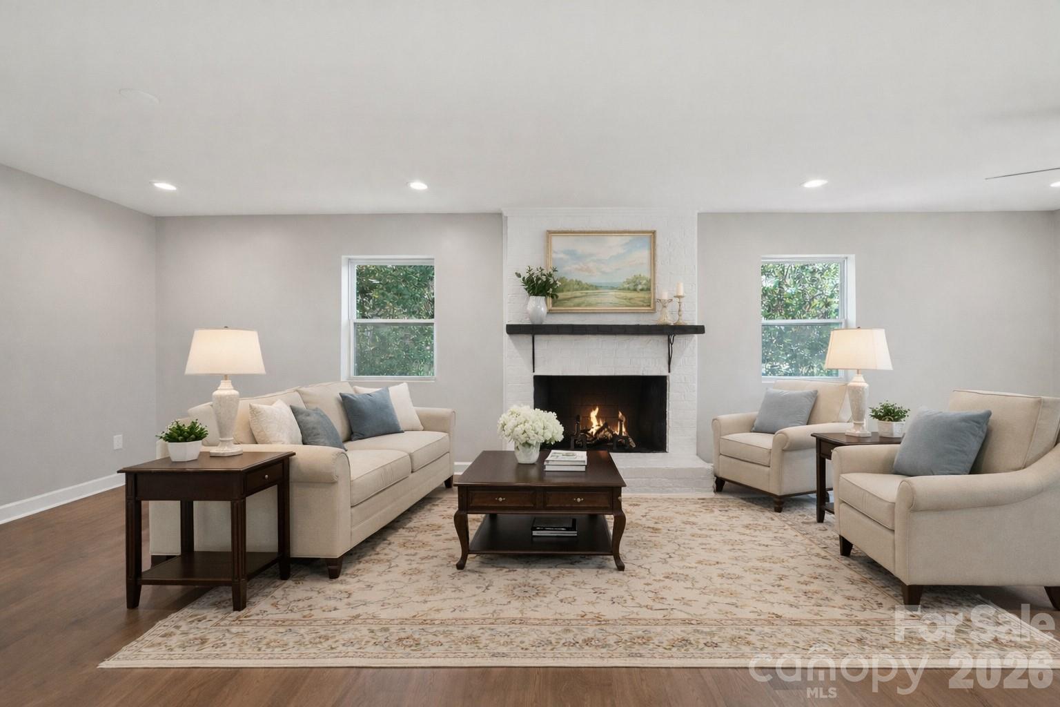 1216 Old Farm Road Charlotte, NC 28226 - Photo 5 of 36 a living room with furniture and a fireplace