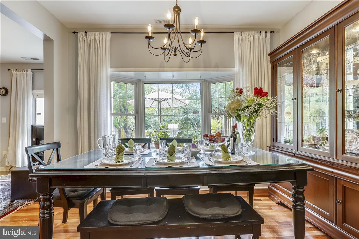 802 Tapawingo Road Southwest Vienna, VA 22180 - Photo 12 of 53 Dining area with large bay window overlooks yard