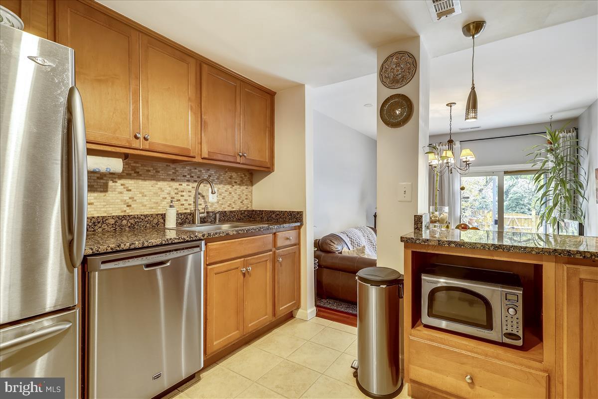 802 Tapawingo Road Southwest Vienna, VA 22180 - Photo 15 of 53 Kitchen features stainless steel appliances