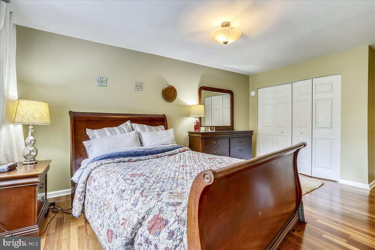 802 Tapawingo Road Southwest Vienna, VA 22180 - Photo 22 of 53 Master Bedroom with hardwood floors