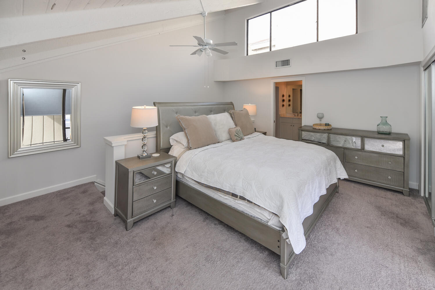 1605 Highway 1, Unit SL3G Jupiter, FL 33477 - Photo 22 of 54 a bed room with a bed and a night stand